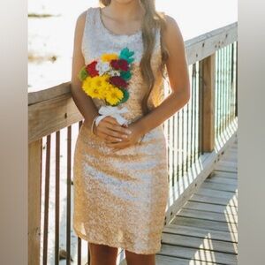 Sequence women homecoming dress 
Gold color size medium but fits like small